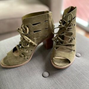 Vince Camuto Tressa perforated lace up bootie.